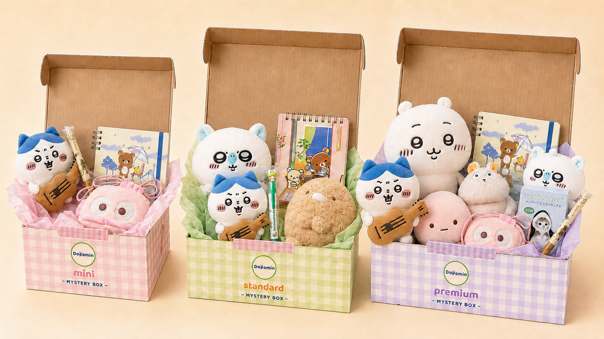 The three Dōpamin mystery boxes, Mini, Standard and Premium, open and filled with genuine kawaii plushies, notebooks and stationery
